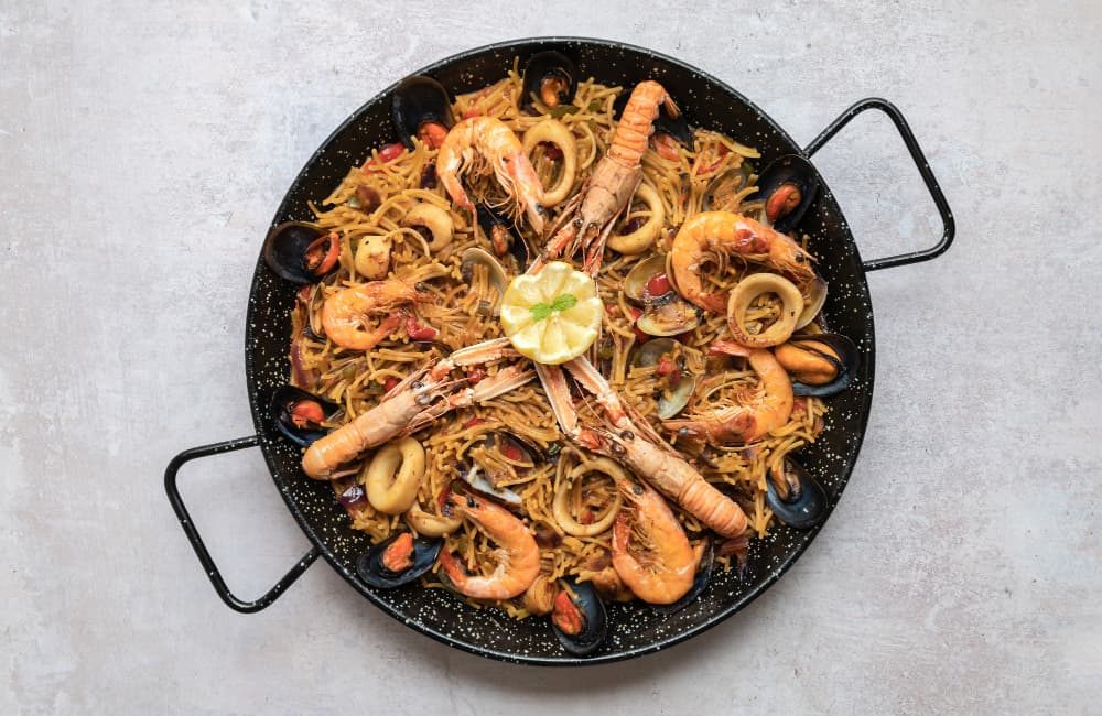 Onde comer Paella: as tradições e histórias