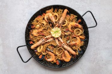 Onde comer Paella: as tradições e histórias