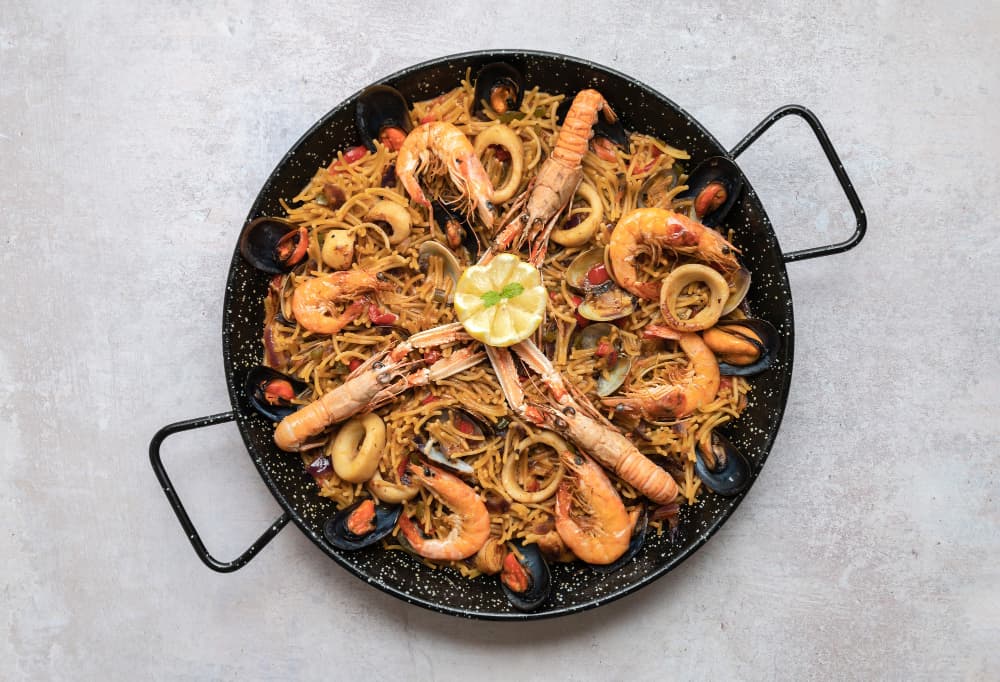 Onde comer Paella: as tradições e histórias